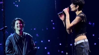 Witness their performance of 'Suga's Interlude' and join the excitement of this remarkable musical synergy. (Image Credit: Suga Agust D/Kia Forum)