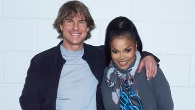 Tom Cruise and Janet Jackson posed for a photo backstage at her concert tour. Tom Cruise and Janet Jackson posed for a photo backstage at her concert tour.