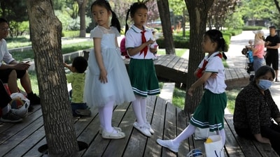 Promoting marrying, having children at appropriate ages, encouraging parents to share child-rearing responsibilities, and curbing high "bride prices" and other outdated customs are the focus of the projects. (REUTERS)