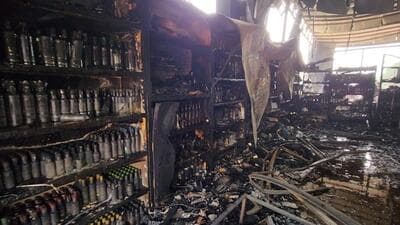 Gurugram, India-May 14, 2023: Fire broke out in a liquor shop at sector-56 road on early morning near sector-55-56 rapid metro station, no one was injured in this incident, in Gurugram, India, on Sunday, 14 May 2023. (Photo by Parveen Kumar/Hindustan Times)