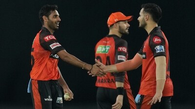Sunrisers Hyderabad team members celebrate the dismissal of Mohammed Shami with their bowler Bhuvneshwar Kumar (AP) Sunrisers Hyderabad team members celebrate the dismissal of Mohammed Shami with their bowler Bhuvneshwar Kumar (AP)