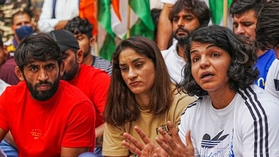 Bajrang Punia, Vinesh Phogat and Sakshi Malik during a press conference regarding wrestlers' protest at Jantar Mantar in New Delhi Sunday, April 23, 2023. (PTI) Bajrang Punia, Vinesh Phogat and Sakshi Malik during a press conference regarding wrestlers' protest at Jantar Mantar in New Delhi Sunday, April 23, 2023. (PTI)