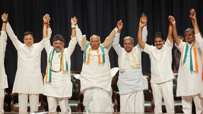 Congress President Mallikarjun Kharge with senior party leaders Siddaramaiah, DK Shivakumar, during the celebrations after the party's win in Karnataka Assembly elections. (PTI) Congress President Mallikarjun Kharge with senior party leaders Siddaramaiah, DK Shivakumar, during the celebrations after the party's win in Karnataka Assembly elections. (PTI)