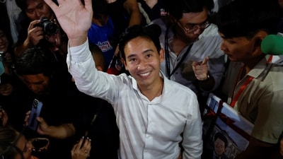 Move Forward Party leader and prime ministerial candidate, Pita Limjaroenrat, waves to the crowd during the general election in Bangkok, Thailand. (REUTERS)