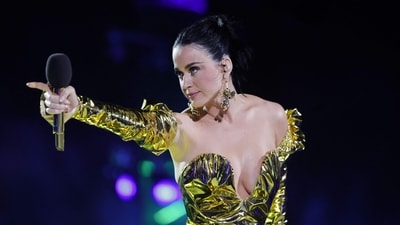 TOPSHOT - US artist Katy Perry performs inside Windsor Castle grounds at the Coronation Concert, in Windsor, west of London on May 7, 2023. - For the first time ever, the East Terrace of Windsor Castle will host a spectacular live concert that will also be seen in over 100 countries around the world. The event will be attended by 20,000 members of the public from across the UK. (AFP) TOPSHOT - US artist Katy Perry performs inside Windsor Castle grounds at the Coronation Concert, in Windsor, west of London on May 7, 2023. - For the first time ever, the East Terrace of Windsor Castle will host a spectacular live concert that will also be seen in over 100 countries around the world. The event will be attended by 20,000 members of the public from across the UK. (AFP)