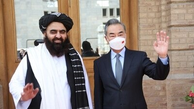 Afghanistan foreign minister with Chinese diplomat (Chinese government) Afghanistan foreign minister with Chinese diplomat (Chinese government)