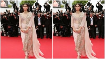 Sonam Kapoor looked ethereal in a silver sequined saree, teamed with a dramatic see-through mesh shrug with a long train. (Pinterest) Sonam Kapoor looked ethereal in a silver sequined saree, teamed with a dramatic see-through mesh shrug with a long train. (Pinterest)