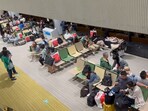 Passengers spent the night at Japan's Narita International Airport. Passengers spent the night at Japan's Narita International Airport.