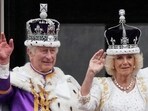 Britain's King Charles III and Queen Camilla wave to the crowds from the balcony of Buckingham Palace after the coronation ceremony in London. Britain's King Charles III and Queen Camilla wave to the crowds from the balcony of Buckingham Palace after the coronation ceremony in London.