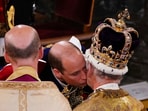 Prince William kisses his father King Charles III during his coronation ceremony at Westminster Abbey in London. Prince William kisses his father King Charles III during his coronation ceremony at Westminster Abbey in London.