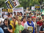 Wrestlers Vinesh Phogat, Sakshi Malik and Sangeeta Phogat with Bhim Army chief Chandra Shekhar Azad and others march towards Connaught Place to protest against Wrestling Federation of India chief Brij Bhushan Sharan Singh Wrestlers Vinesh Phogat, Sakshi Malik and Sangeeta Phogat with Bhim Army chief Chandra Shekhar Azad and others march towards Connaught Place to protest against Wrestling Federation of India chief Brij Bhushan Sharan Singh