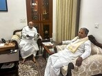 Congress President Mallikarjun Kharge interacts with senior party leader Siddaramaiah. Congress President Mallikarjun Kharge interacts with senior party leader Siddaramaiah.