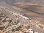 Smoke rises over the city as army and paramilitaries clash in power struggle, in Khartoum, Sudan,