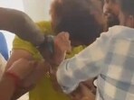 Ram Charan's fans beat up a man over his comments against Upasana Konidela. Ram Charan's fans beat up a man over his comments against Upasana Konidela.