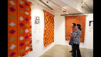 A couple admires the phulkari dupattas preserved in the family of Lajwanti Devi since 1900. (Photo: Gokul VS) A couple admires the phulkari dupattas preserved in the family of Lajwanti Devi since 1900. (Photo: Gokul VS)