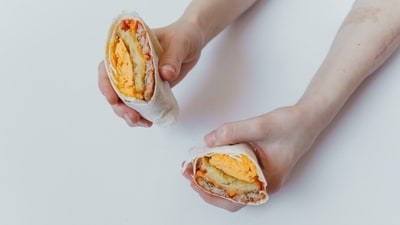 Breakfast burrito: Fill a tortilla with scrambled eggs, cooked bacon or sausage, shredded cheese, and your favourite toppings like salsa or avocado. Wrap it up and enjoy a satisfying breakfast on the go. (Pexels) Breakfast burrito: Fill a tortilla with scrambled eggs, cooked bacon or sausage, shredded cheese, and your favourite toppings like salsa or avocado. Wrap it up and enjoy a satisfying breakfast on the go. (Pexels)