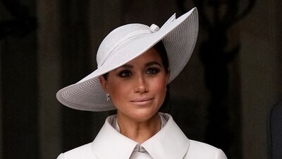 Meghan Markle, Duchess of Sussex leave after a service of thanksgiving for the reign of Queen Elizabeth II at St Paul's Cathedral in London. (AP) Meghan Markle, Duchess of Sussex leave after a service of thanksgiving for the reign of Queen Elizabeth II at St Paul's Cathedral in London. (AP)