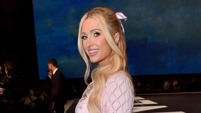 Paris Hilton attends the Chanel Cruise 2023/2024 Fashion Show. (Jordan Strauss/Invision/AP) Paris Hilton attends the Chanel Cruise 2023/2024 Fashion Show. (Jordan Strauss/Invision/AP)