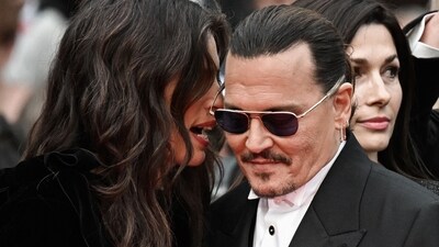 The Cannes red carpet sprang to life again Tuesday with the premiere of the Louis XV period drama Jeanne du Barry with Johnny Depp, as the French Riviera movie pageant launched a star-studded and potentially controversy-rife 76th edition. (AFP) The Cannes red carpet sprang to life again Tuesday with the premiere of the Louis XV period drama Jeanne du Barry with Johnny Depp, as the French Riviera movie pageant launched a star-studded and potentially controversy-rife 76th edition. (AFP)
