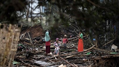 Cyclone Mocha: Rohingya women in their destroyed house at Basara refugee camp in Sittwe. (AFP)