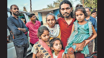 Mumbai, India - May 16, 2023: Arjun Daware, a fisherman who returned from Pakistan after three-and-half years breaks down with tears of joy after seeing his 4-year-old daughter and family members, at Aamgaon, in Palghar district on Mumbai-Ahmedabad Highway, May 16, 2023. (Photo by Satish Bate/ Hindustan Times) (Satish Bate/HT PHOTO) Mumbai, India - May 16, 2023: Arjun Daware, a fisherman who returned from Pakistan after three-and-half years breaks down with tears of joy after seeing his 4-year-old daughter and family members, at Aamgaon, in Palghar district on Mumbai-Ahmedabad Highway, May 16, 2023. (Photo by Satish Bate/ Hindustan Times) (Satish Bate/HT PHOTO)