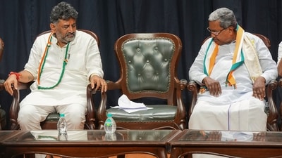 Former Karnataka CM Siddaramaiah and Karnataka Congress president DK Shivakumar during celebrations after the party's win in Karnataka assembly elections in Bengaluru. (PTI) Former Karnataka CM Siddaramaiah and Karnataka Congress president DK Shivakumar during celebrations after the party's win in Karnataka assembly elections in Bengaluru. (PTI)
