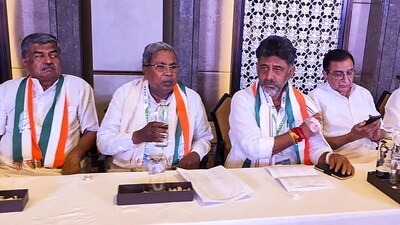 Senior Congress leaders Siddaramaiah, DK Shivakumar and others during the CLP meeting in Bengaluru on Sunday. (PTI) Senior Congress leaders Siddaramaiah, DK Shivakumar and others during the CLP meeting in Bengaluru on Sunday. (PTI)