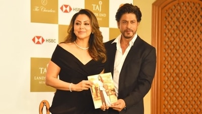 Shah Rukh Khan and Gauri Khan in elegant outfits for her book launch event. (HT Photo/Varinder Chawla) Shah Rukh Khan and Gauri Khan in elegant outfits for her book launch event. (HT Photo/Varinder Chawla)