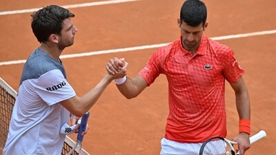 Britain's Cameron Norrie (L) and Serbia's Novak Djokovic shake hands after Djokovic won their fourth round match (AFP) Britain's Cameron Norrie (L) and Serbia's Novak Djokovic shake hands after Djokovic won their fourth round match (AFP)