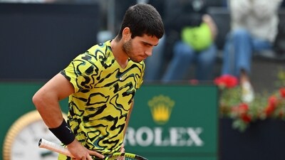 Spain's Carlos Alcaraz reacts after losing his third round match of the Men's ATP Rome Open tennis tournament to Hungary's Fabian Marozsan, at Foro Italico in Rome (AFP) Spain's Carlos Alcaraz reacts after losing his third round match of the Men's ATP Rome Open tennis tournament to Hungary's Fabian Marozsan, at Foro Italico in Rome (AFP)