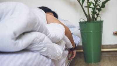 Sleeping on your stomach: While it's not the most recommended sleeping position, sleeping on your stomach with a pillow under your hips can help alleviate cramping by reducing the pressure on your uterus.&nbsp; (Unsplash)