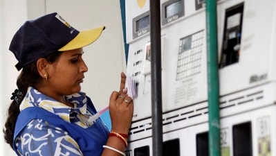 A woman employee works at a petrol pump in Kolkata. (REUTERS/ File)