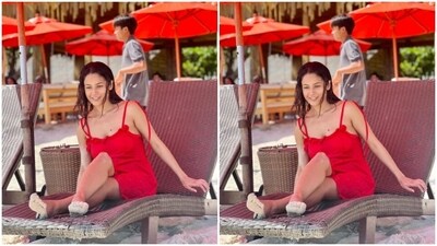In wet hair, sand in her feet and a big smile, Shehnaaz posed for the pictures. (Instagram/@shehnaazgill) In wet hair, sand in her feet and a big smile, Shehnaaz posed for the pictures. (Instagram/@shehnaazgill)