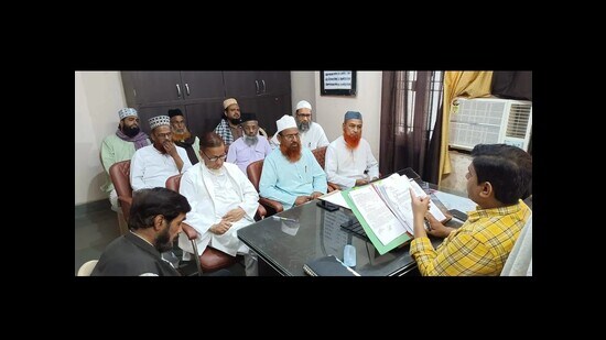 Ashutosh Pandey, district minority welfare officer, holding a meeting with principals of madrasas on Tuesday (HT Photo)