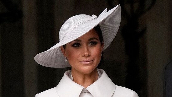 Meghan Markle, Duchess of Sussex leave after a service of thanksgiving for the reign of Queen Elizabeth II at St Paul's Cathedral in London. (AP)