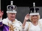 Britain's King Charles III and Queen Camilla wave to the crowds from the balcony of Buckingham Palace after the coronation ceremony in London. Britain's King Charles III and Queen Camilla wave to the crowds from the balcony of Buckingham Palace after the coronation ceremony in London.