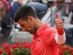 Serbia's Novak Djokovic gestures during the quarter final match against Denmark's Holger Rune at the Italian Open tennis tournament, in Rome, Wednesday, May 17, 2023. (AP Photo/Gregorio Borgia) Serbia's Novak Djokovic gestures during the quarter final match against Denmark's Holger Rune at the Italian Open tennis tournament, in Rome, Wednesday, May 17, 2023. (AP Photo/Gregorio Borgia)