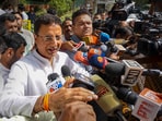 Senior Congress leader Randeep Surjewala addresses the media gathered outside the residence of party President Mallikarjun Kharge, in New Delhi, Wednesday, May 17, 2023.