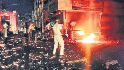 Akola: Police and other security personnel attempt to maintain law and order after a clash broke out between members of two communities over a social media post, in Akola, Maharashtra, Saturday, May 13, 2023. (PTI) Akola: Police and other security personnel attempt to maintain law and order after a clash broke out between members of two communities over a social media post, in Akola, Maharashtra, Saturday, May 13, 2023. (PTI)