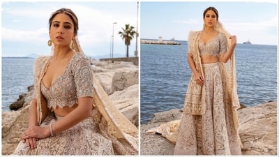 Sara Ali Khan walked the red carpet of the most awaited Cannes International Film Festival 2023 on Tuesday wearing an exquisite hand-embroidered ivory lehenga set created by the designer duo Abu Jani Sandeep Khosla. (Instagram/@saralikhan95) Sara Ali Khan walked the red carpet of the most awaited Cannes International Film Festival 2023 on Tuesday wearing an exquisite hand-embroidered ivory lehenga set created by the designer duo Abu Jani Sandeep Khosla. (Instagram/@saralikhan95)