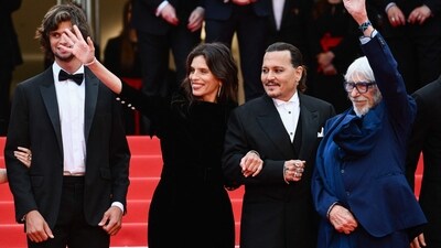 Johnny Depp completed his look with a black wool and mohair vest and a white silk pocket square. (AFP) Johnny Depp completed his look with a black wool and mohair vest and a white silk pocket square. (AFP)