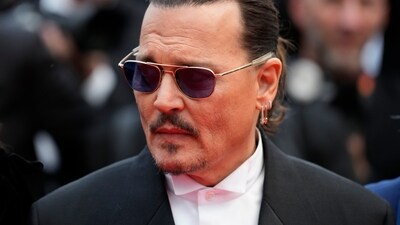 Johnny Depp was seen signing autographs and taking pictures with fans before the premiere of the Cannes Film Festival's opening film Jeanne du Barry. (Scott Garfitt/Invision/AP) Johnny Depp was seen signing autographs and taking pictures with fans before the premiere of the Cannes Film Festival's opening film Jeanne du Barry. (Scott Garfitt/Invision/AP)