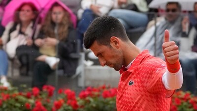 Serbia's Novak Djokovic gestures during the quarter final match against Denmark's Holger Rune at the Italian Open tennis tournament, in Rome, Wednesday, May 17, 2023. (AP Photo/Gregorio Borgia) (AP) Serbia's Novak Djokovic gestures during the quarter final match against Denmark's Holger Rune at the Italian Open tennis tournament, in Rome, Wednesday, May 17, 2023. (AP Photo/Gregorio Borgia) (AP)