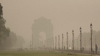 A thick layer of dust is seen engulfed around the city at Kartavya Path in New Delhi. A thick layer of dust is seen engulfed around the city at Kartavya Path in New Delhi.