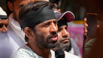 Wrestler Bajrang Punia addresses the press during ongoing protest against Wrestling Federation of India (WFI) chief Brij Bhushan Sharan Singh, at Jantar Mantar (PTI) Wrestler Bajrang Punia addresses the press during ongoing protest against Wrestling Federation of India (WFI) chief Brij Bhushan Sharan Singh, at Jantar Mantar (PTI)