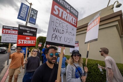 People picket outside of Paramount Pictures studios during the Hollywood writers strike on May 4, 2023 in Los Angeles, California. Scripted TV series, late-night talk shows, film and streaming productions are being interrupted by the Writers Guild of America (WGA) strike. (Getty Images via AFP) People picket outside of Paramount Pictures studios during the Hollywood writers strike on May 4, 2023 in Los Angeles, California. Scripted TV series, late-night talk shows, film and streaming productions are being interrupted by the Writers Guild of America (WGA) strike. (Getty Images via AFP)