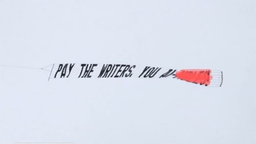 A banner message carried by an air plane over Hollywood reading, 'PAY THE WRITERS YOU AI-H***S' in support of WGA strike. (FOX) A banner message carried by an air plane over Hollywood reading, 'PAY THE WRITERS YOU AI-H***S' in support of WGA strike. (FOX)