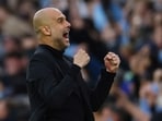 Manchester City manager Pep Guardiola celebrates their first goal scored by Bernardo Silva