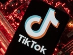 A smartphone with a displayed TikTok logo 