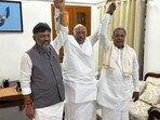 Congress president Mallikarjun Kharge with DK Shivakumar and Siddaramaiah. Congress president Mallikarjun Kharge with DK Shivakumar and Siddaramaiah.